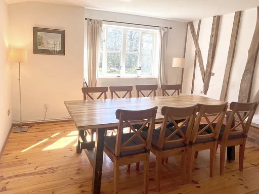 The Farmhouse Outside and Living spaces