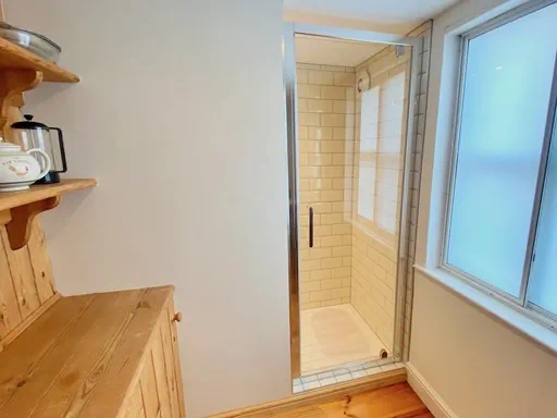 The Farmhouse Outside and Living spaces