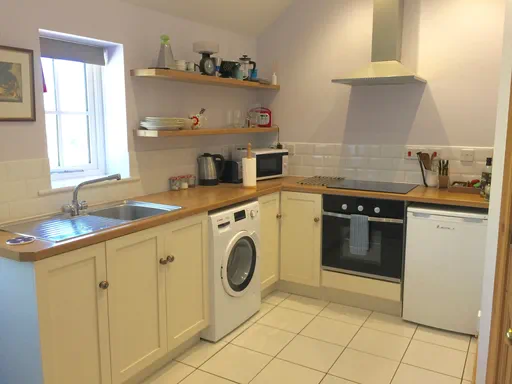 The Stables Outside and Living spaces